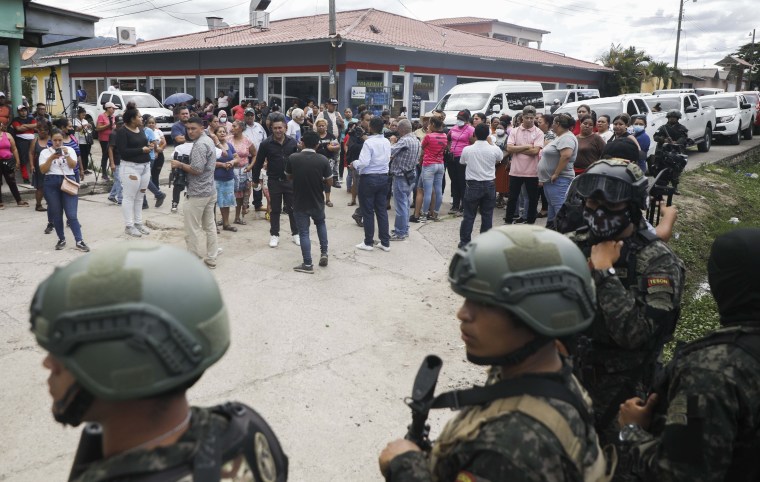 Police guard the entrance to the women's prison in Tamara, on the outskirts of Tegucigalpa, Honduras on June 20, 2023. 