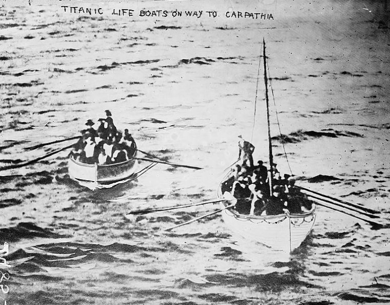 Image: Titanic survivors in life boats on their way to the RMS Carpathia in 1912.