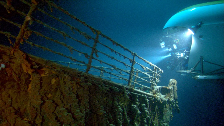 Image: A MIR submersible observes the boy of the Titanic wreckage in 2003.