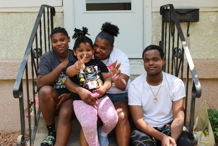 Jimari Brown, Center, poses with her family, from left, Je’Nye Brown, 17, Jai’Brieanne Brown, 3, and Jameatrius Bailey, 18.