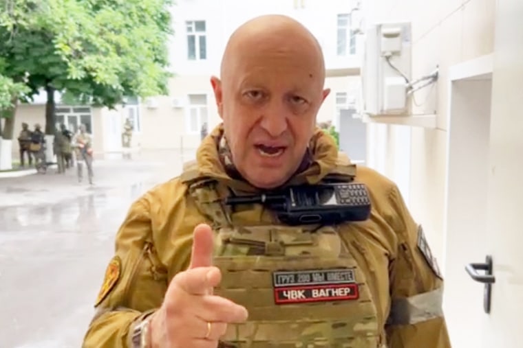 Yevgeny Prigozhin speaks inside the headquarters of the Russian South Military District in Rostov-on-Don, Russia