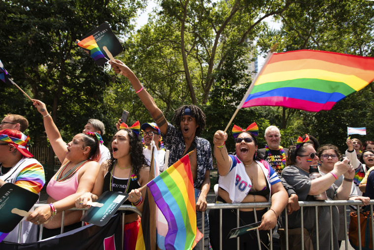 People watch the Pride parade in New York on June 25, 2023.