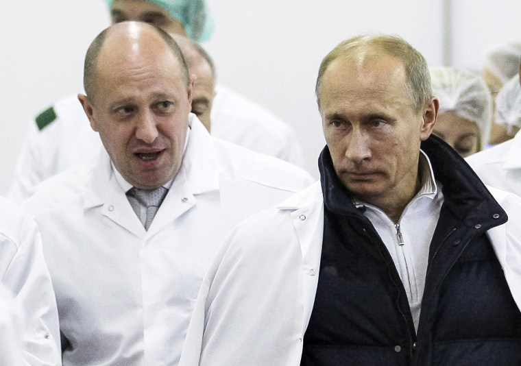 Yevgeny Prigozhin shows Russian President Vladimir Putin around his factory outside St Petersburg September 20, 2010.