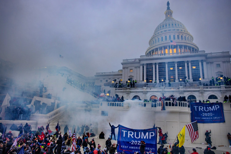 Tear gas is fired at supporters of President Trump who stormed the Capitol building on Jan. 6, 2021. 