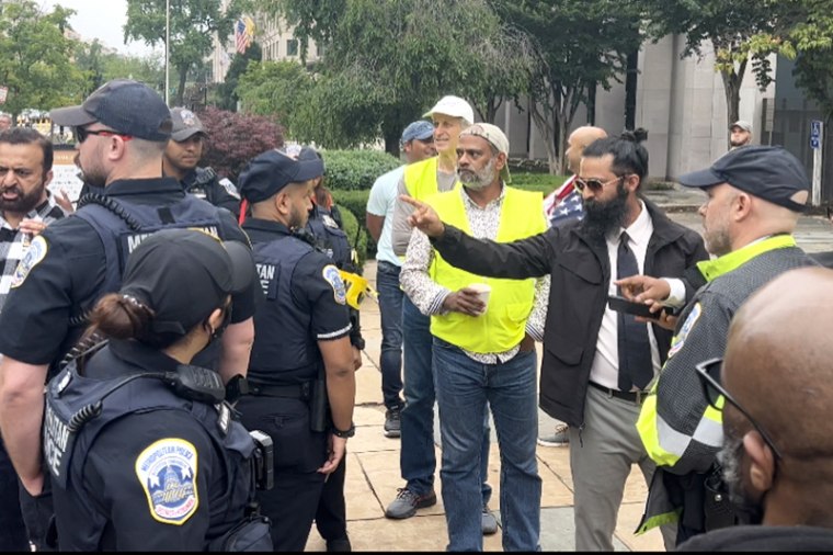 Police deescalate confrontation at protest near the White House during Prime Minister Narendra Modi's state visit.