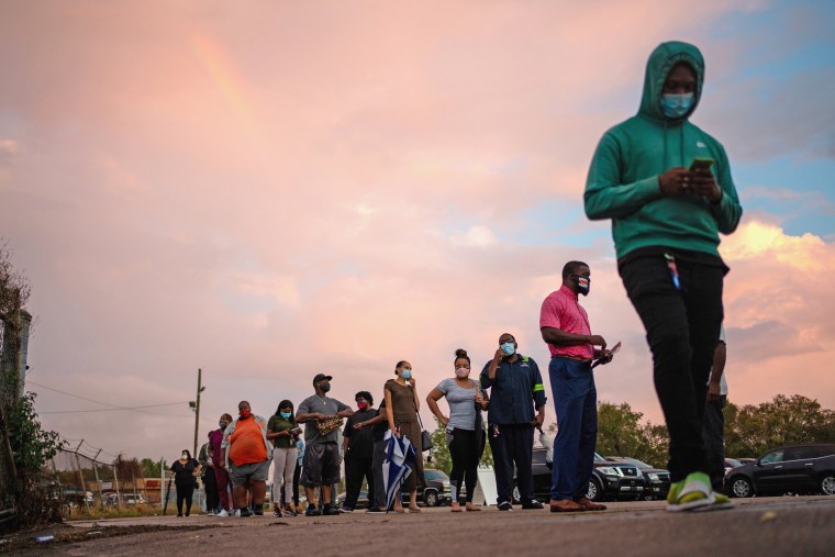 Voters line up in New Orleans during early voting for the presidential election on Oct. 27, 2020. 