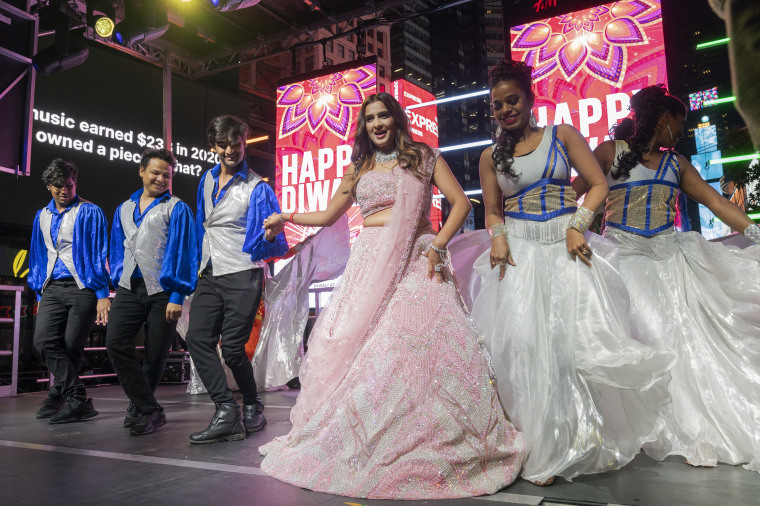 Artists perform during a Diwali celebration on a stage in Times Square