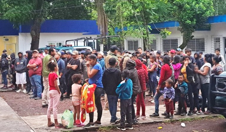 Another 130 Guatemalan migrants had been detained in a truck in Veracruz on Monday. Image blurred by source.