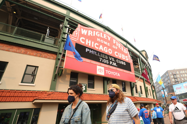 Fans arrive prior to the game between the Chicago Cubs and the Philadelphia Phillies at Wrigley Field on June 27, 2023 in Chicago, Illinois. A air quality alert was issued due to smoke from Canadian wildfires.