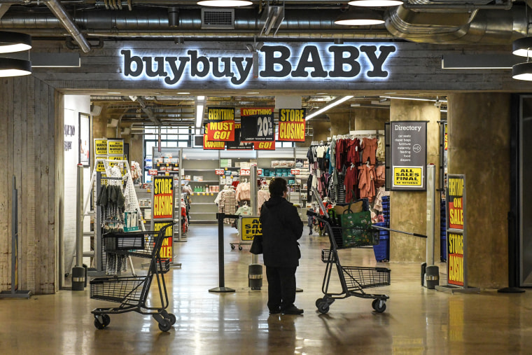 A person looks into a Buy Buy Baby store in Brooklyn, N.Y.