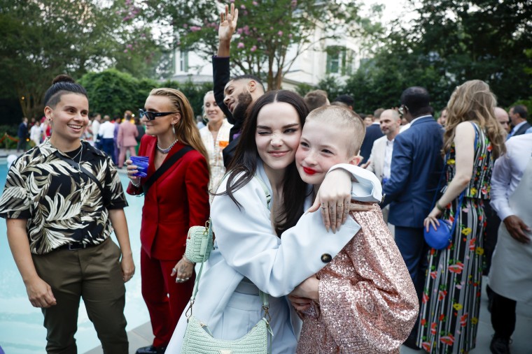 Dove Cameron, left, attends a Pride Celebration hosted by Kamala Harris, in Washington, D.C.