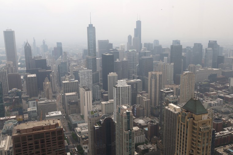 Wildfire smoke obscures the view of the skyline, in Chicago