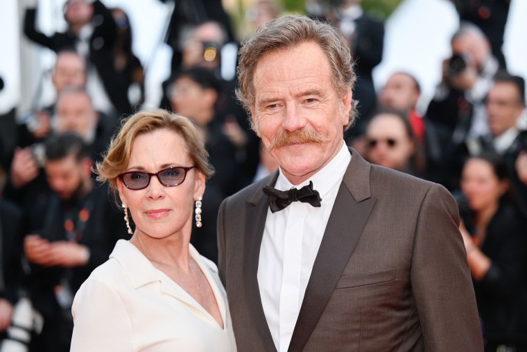 Robin Dearden and Bryan Cranston attends the "Asteroid City" red carpet during the 76th annual Cannes film festival at Palais des Festivals on May 23, 2023 in Cannes, France.