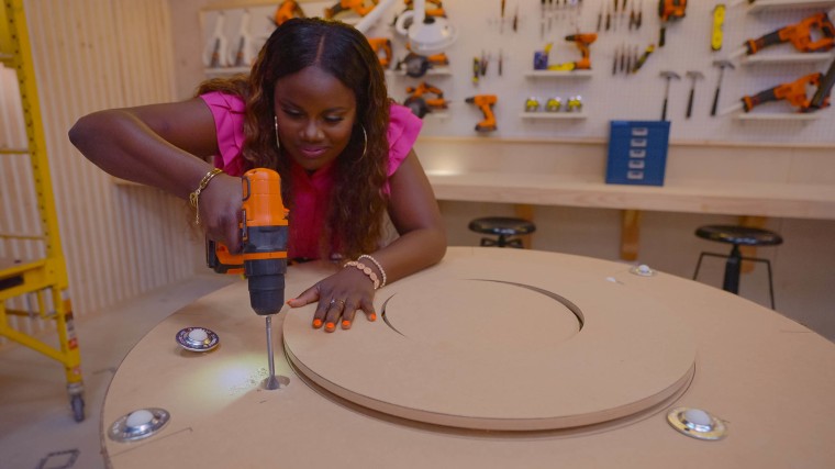 Ati Williams shows off her construction skills in Episode One of "Hack My Home."