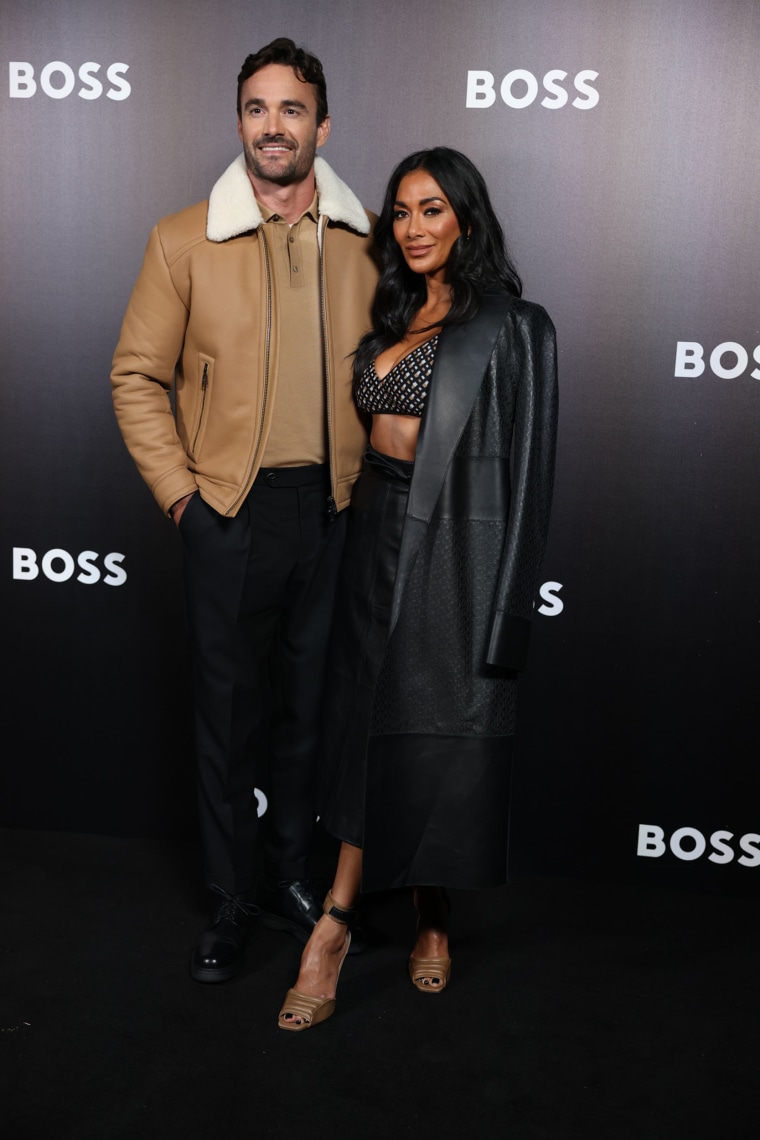 Thom Evans and Nicole Scherzinger are seen arriving at the Boss Fashion Show during the Milan Fashion Week Womenswear Spring/Summer 2023 on September 22, 2022 in Milan, Italy. 