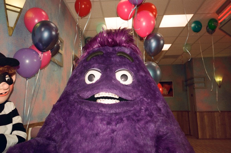 Teenage Grimace celebrates his birthday with his pal, the Hamburglar.