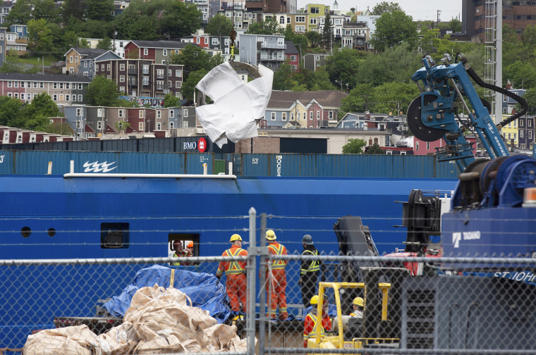 Debris from the Titan submersible, recovered from the ocean floor near the wreck of the Titanic, is unloaded from the ship Horizon Arctic at the Canadian Coast Guard pier in St. John's, Newfoundland, Wednesday, June 28, 2023.