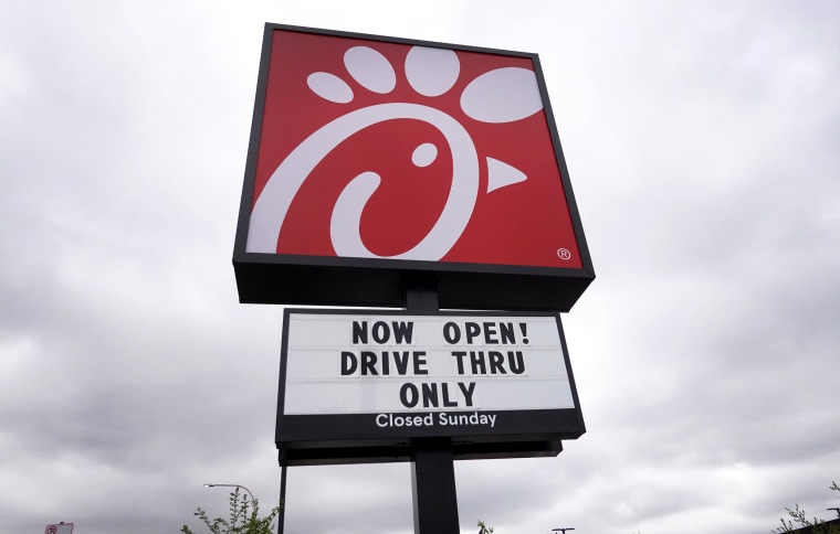 A sign hangs outside of a Chick-fil-A restaurant on May 06, 2021 in Chicago, Illinois.