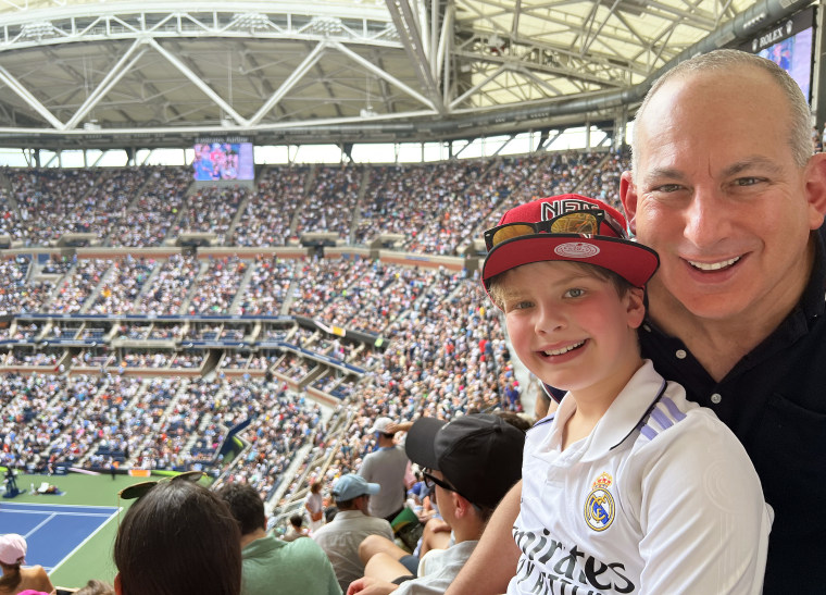 My husband, Jack, with our son, Lucas, at the U.S. Open.