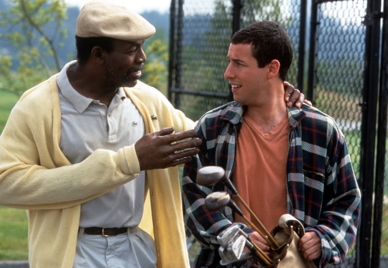 Carl Weathers talks to Adam Sandler in a scene from the film "Happy Gilmore."