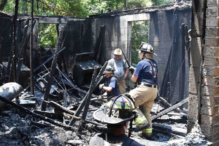 Colleton County Fire Rescue personnel investigate the fire in in southern Colleton County, S.C, on July 2, 2023.
