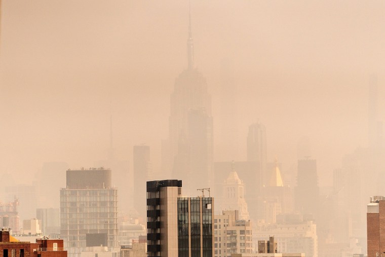 NEW YORK, NEW YORK - JUNE 30: Smoke from wildfires in Canada shrouds the Empire State Building on June 30, 2023 in New York City.  The eastern U.S. is once again experiencing air quality concerns as smoke from Canadian wildfires billows south with New York City's air quality index reaching 162 in many places.  (Photo by David Dee Delgado/Getty Images) ***BESTPIX***
