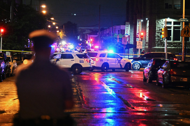 Police work the scene of a shooting on July 3, 2023 in Philadelphia, Pennsylvania. Early reports say the suspect is in custody after shooting 8 people in the Kingsessing section of Philadelphia on July 3rd.