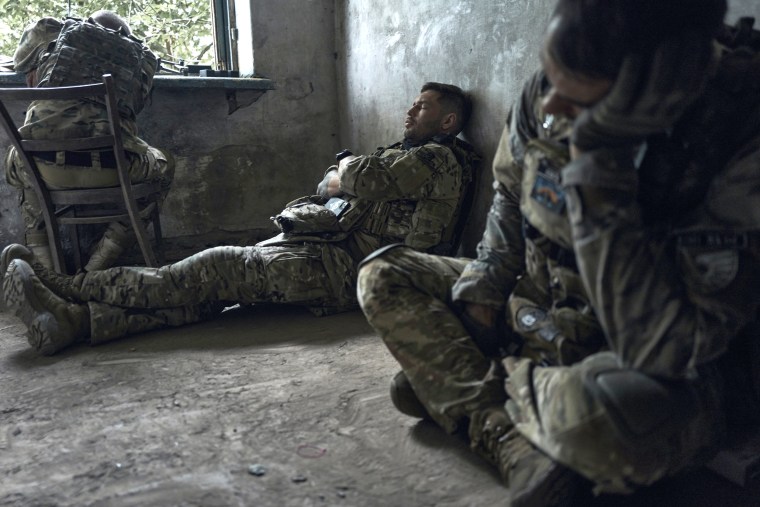 Ukrainian soldiers have a short rest in a shelter on the frontline in Zaporizhzhia, Ukraine