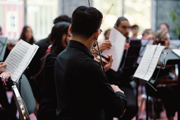 The students from the Orquesta Sinf&oacute;nica Esperanza Azteca Youth Orchestra play at a music concert in Washington, D.C. 
