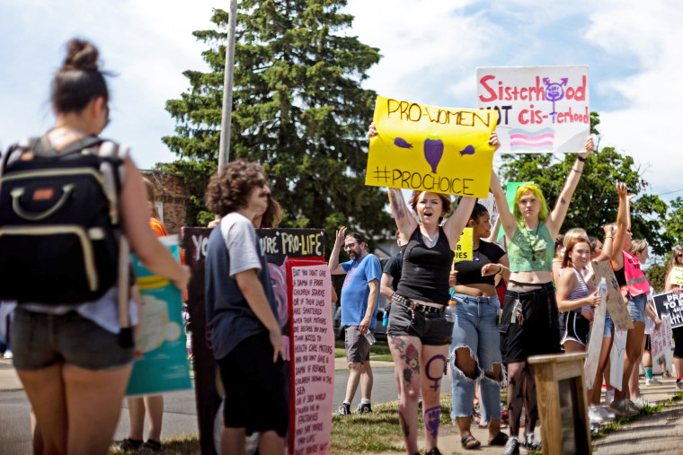 Abortion rights demonstrators protest an anti-abortion rally in Toledo, Ohio