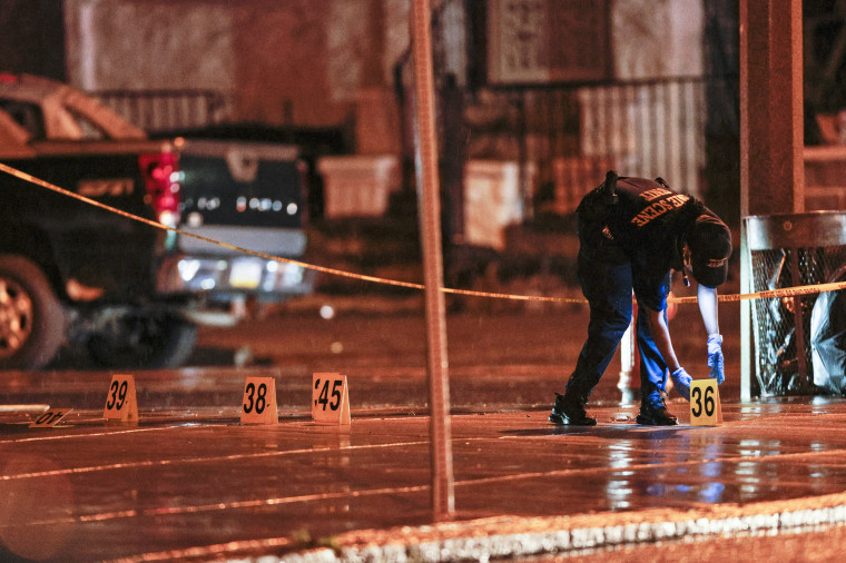 Police work at the scene of a mass shooting in Philadelphia