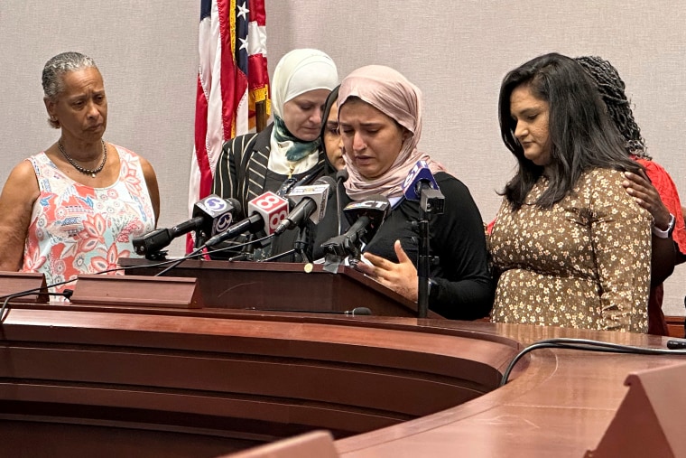 Rep. Maryam Khan, surrounded by friends, family and fellow lawmakers, at a news conference in Hartford, Conn., Thursday July 6, 2023.