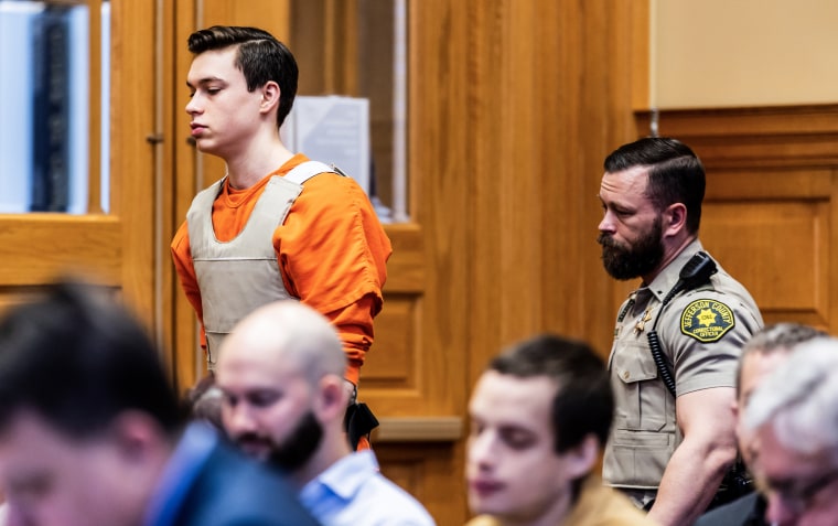 Willard Miller is led into a courtroom,  in Fairfield, Iowa on March 29, 2023, for a hearing related to the murder charge he faces in the 2021 death of Spanish teacher Nohema Graber. 