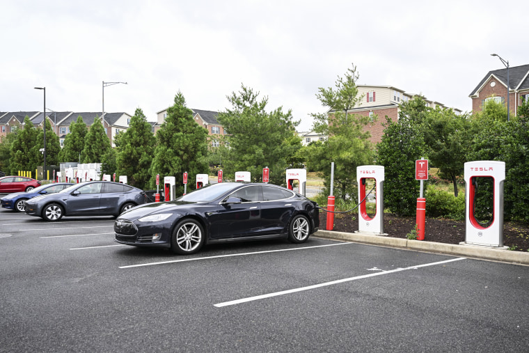 A Tesla charges at a station in Washington D.C.