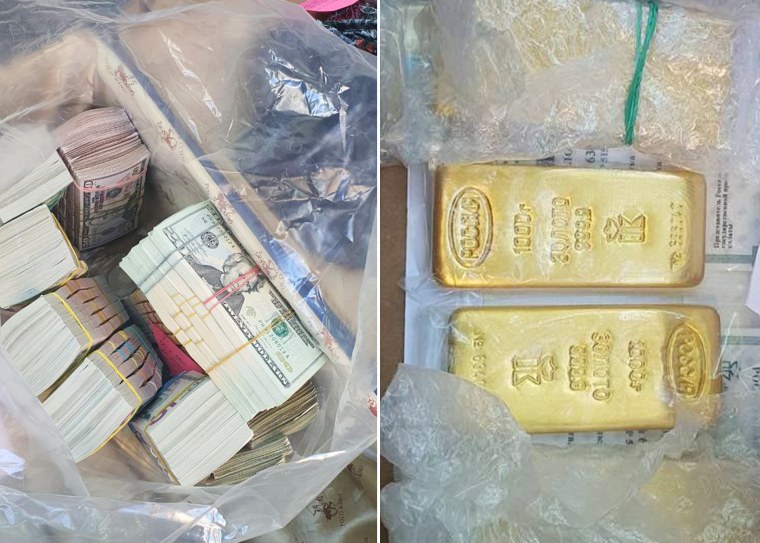 Wads of U.S. dollars and gold bars were seized during the raid. 