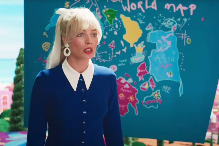 Margot Robbie in a scene from "Barbie" that shows her standing next to a map that appears to depict China's nine-dash line in the South China Sea. 