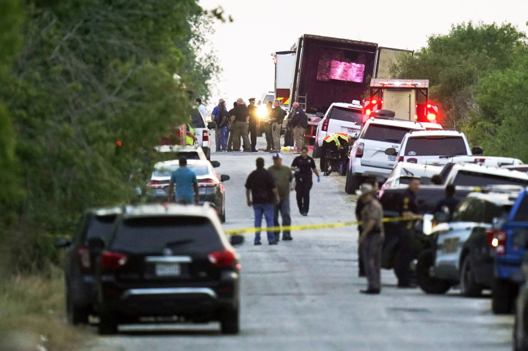 Police and other first responders work the scene where officials say dozens of people have been found dead and multiple others were taken to hospitals with heat-related illnesses after a semitrailer containing suspected migrants was found, Monday, June 27, 2022, in San Antonio.