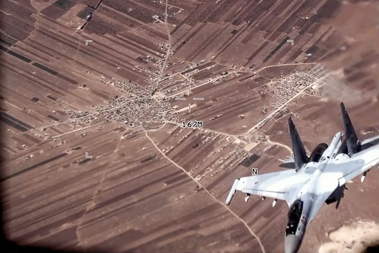 A Russian SU-35 flies near a U.S. Air Force MQ-9 Reaper drone over Syria on July 5, 2023.