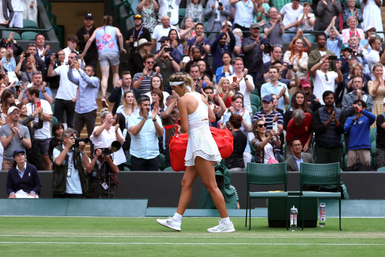 Victoria Azarenka leaves the court following her defeat against Elina Svitolina during the Wimbledon tennis championships in London