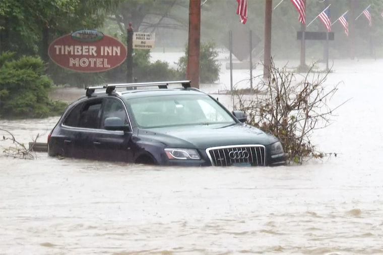 A car is flooded in Ludlow, Vt., on July 10, 2023.