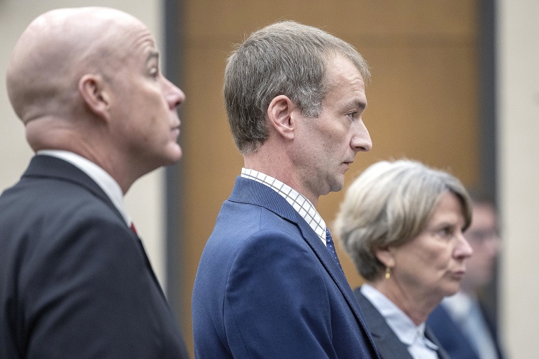 Flanked by his attorneys Thomas Plunkett, left, and Deborah Ellis, former Minneapolis police officer Brian Cummings listens to Judge Tamara Garcia during his sentencing at the Hennepin Government Center in Minneapolis, Minn., on Wednesday, July 12, 2023. Cummings pleaded guilty to criminal vehicular homicide for a chase of a suspected carjacker that resulted in a crash that killed Leneal Frazier, who was uninvolved in the chase.