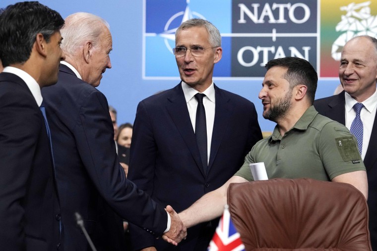 NATO leaders gathered Wednesday to launch a highly symbolic new forum for ties with Ukraine, after committing to provide the country with more military assistance for fighting Russia but only vague assurances of future membership. (AP Photo/Pavel Golovkin)