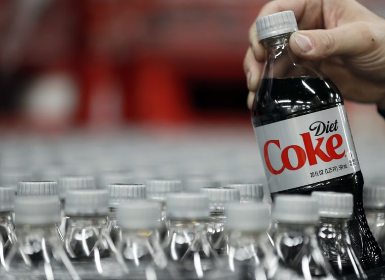 A bottle of Diet Coke is pulled for a quality control test at a Coco-Cola bottling plant in Salt Lake City, Utah