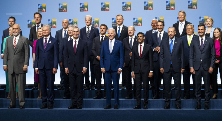 Joe Biden, center, during a family photo with Heads of State at the NATO Summit in Vilnius, Lithuania