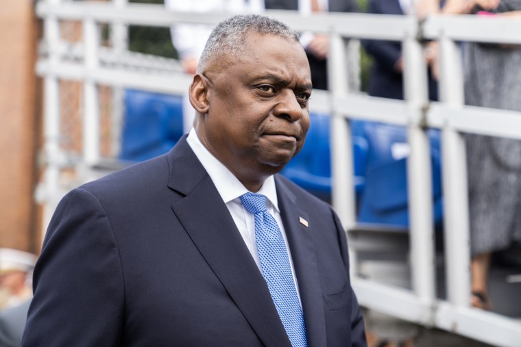 Lloyd Austin attends a relinquishment of office ceremony for former commandant Gen. David Berger at the Marine Barracks Washington