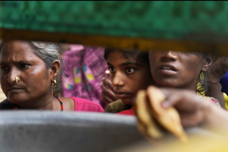 Residential areas close to the river were flooded, submerging roads, cars and homes, leading to the evacuation of thousands of people from low-lying areas in the country's capital city. More than 100 people were killed this week after record monsoon rains led to massive waterlogging, road caves-in, collapsed homes and gridlocked traffic, officials said Thursday.