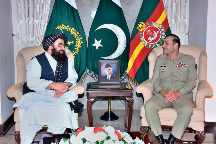 The Taliban-appointed Afghan Foreign Minister Amir Khan Muttaqi, left, meets with Pakistan's Army Chief General Asim Munir, in Rawalpindi, Pakistan on May 7, 2023. 