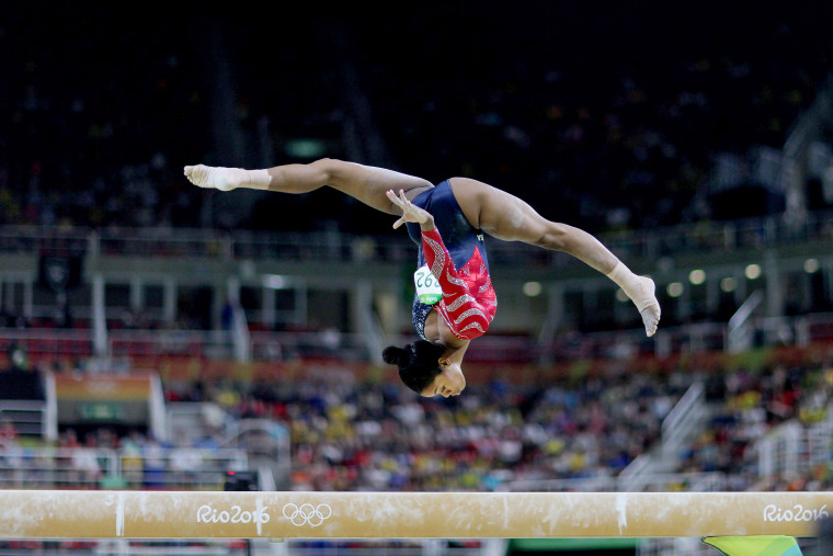 Gabby Douglas performs on the balance beam at the Rio Olympics in 2016.