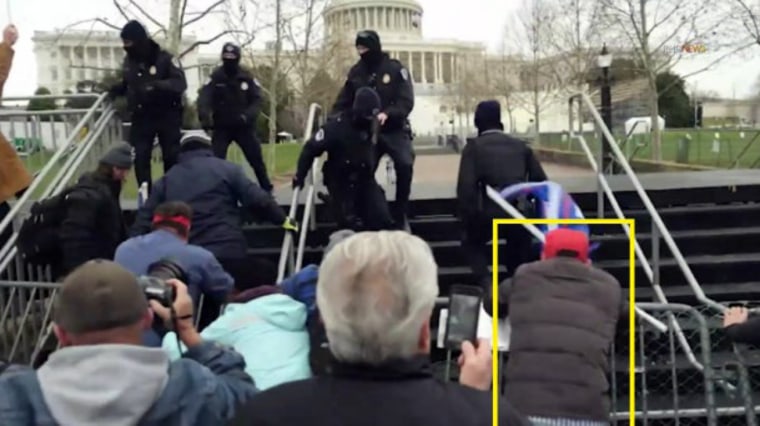 The FBI said Spencer Geller, right, took part in the initial breach of the barricades on the western side of the U.S. Capitol and was in the front of the mob as it made its way toward the building.