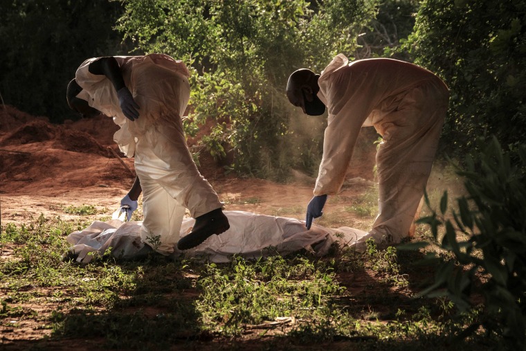 Digged holes are seen after exhuming bodies at the mass-grave site in Shakahola, outside the coastal town of Malindi, on April 25, 2023. The death toll in an investigation linked to a Kenyan cult that practised starvation to "meet Jesus Christ" has exceeded 400 after 12 new bodies were found on July 17, 2023, a senior official said.